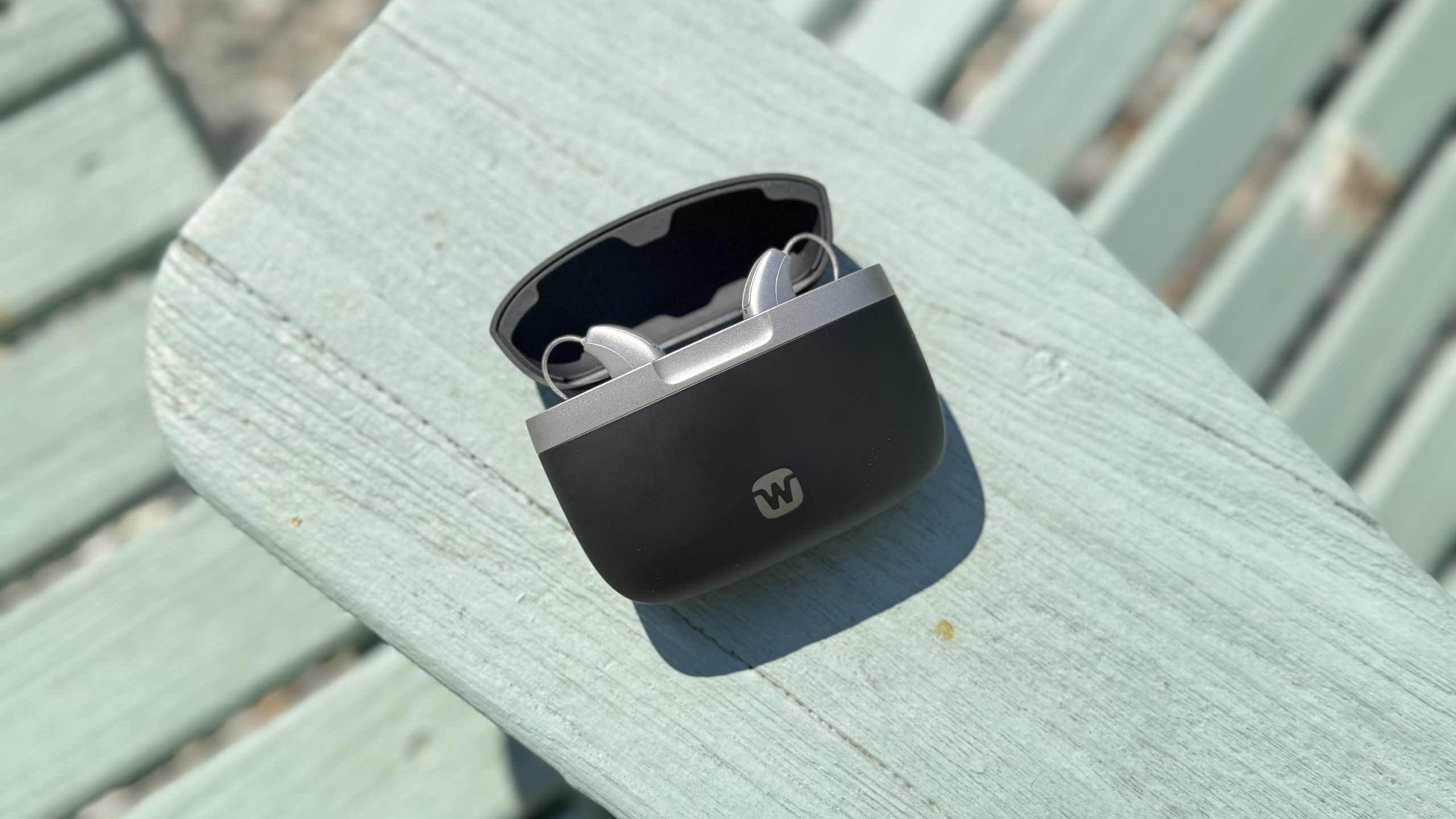 Widex rechargeable hearing aids in their charging case