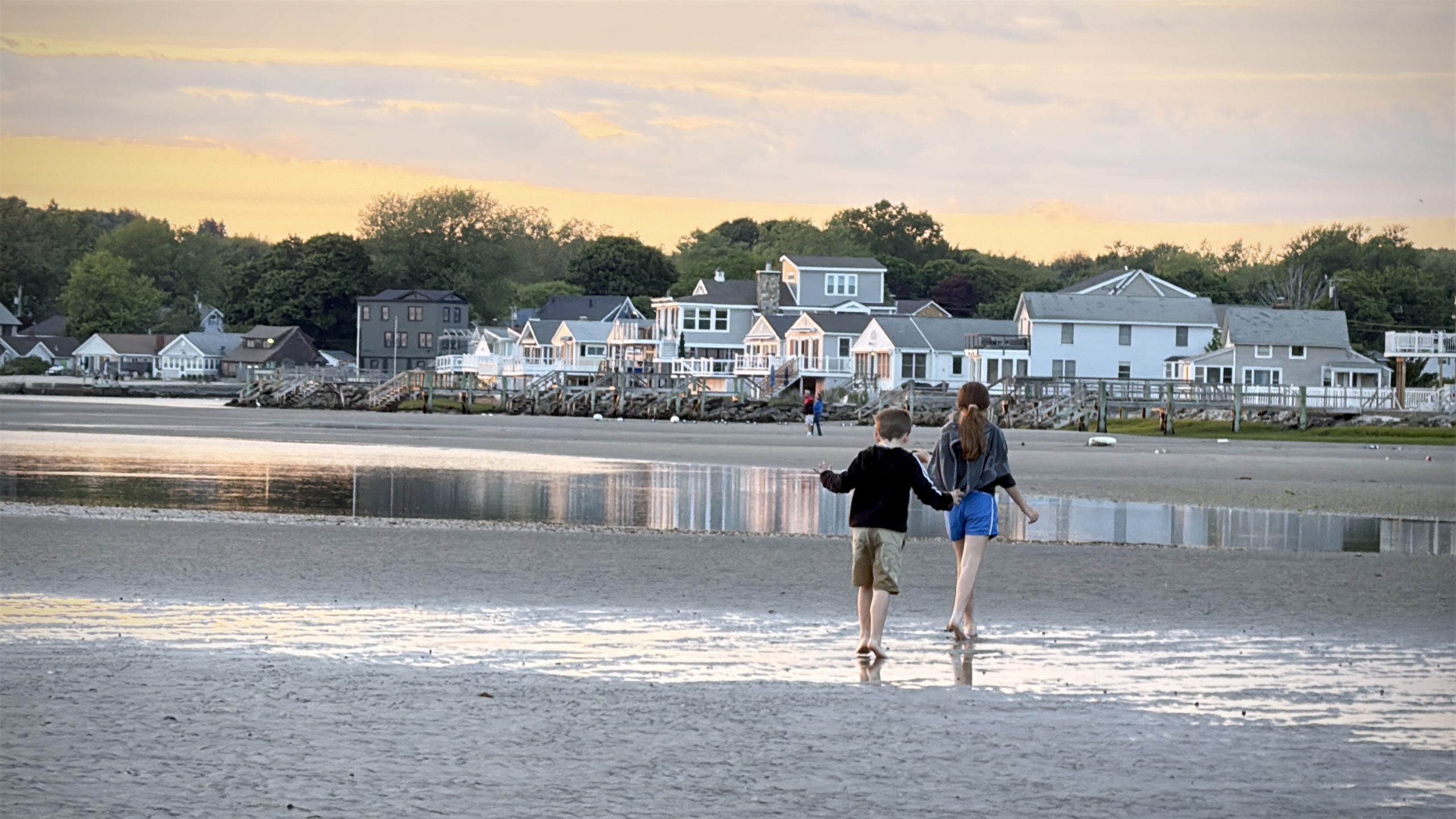 Children playing along the Connecticut shoreline